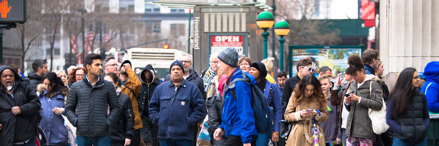 Crowd waiting to cross a street