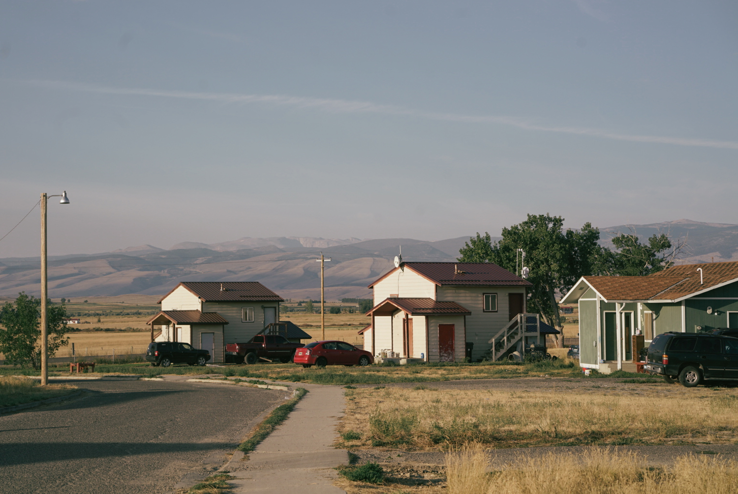 The sun rises over subsidized housing on the Wind River Indian Reservation.