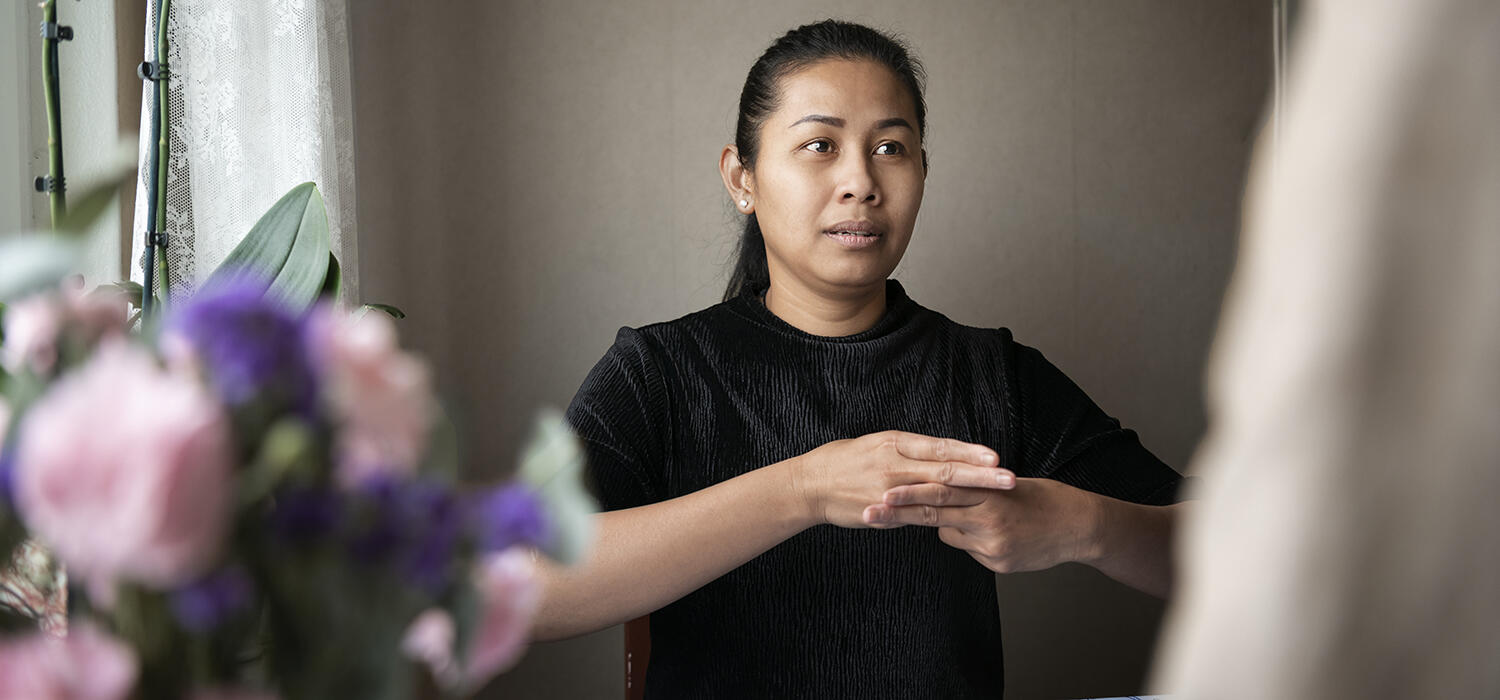 Woman signing with hands