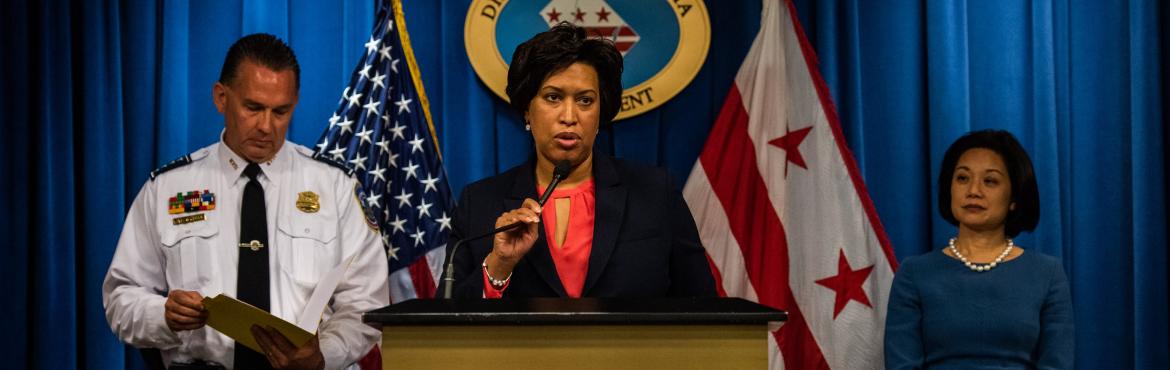 Mayor Muriel Bowser, center, along with United States Attorney for the District of Columbia Jessie K. Liu, right, and D.C Police Chief Peter Newsham, speaks during a press conference.
