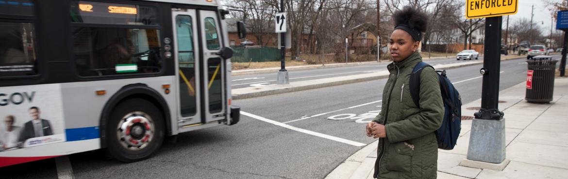 India waits to cross an intersection on her walk home from Kelly Miller Middle School