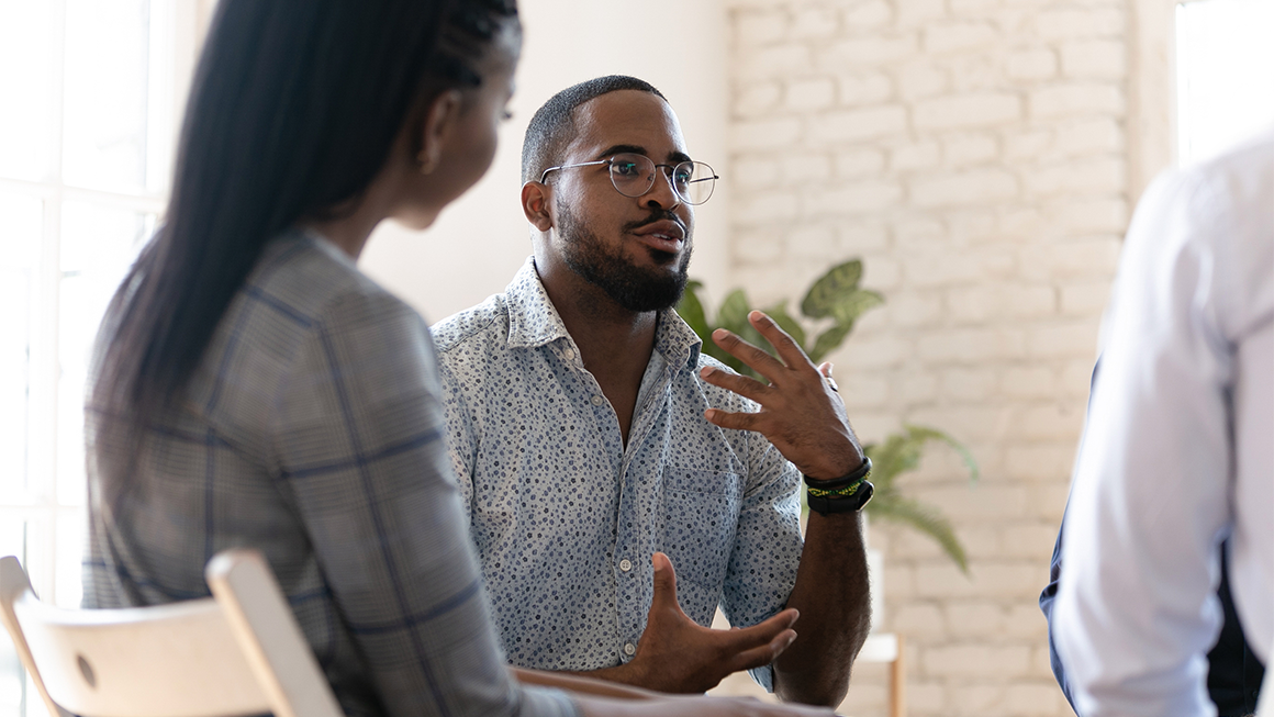 African American man speak at group therapy session