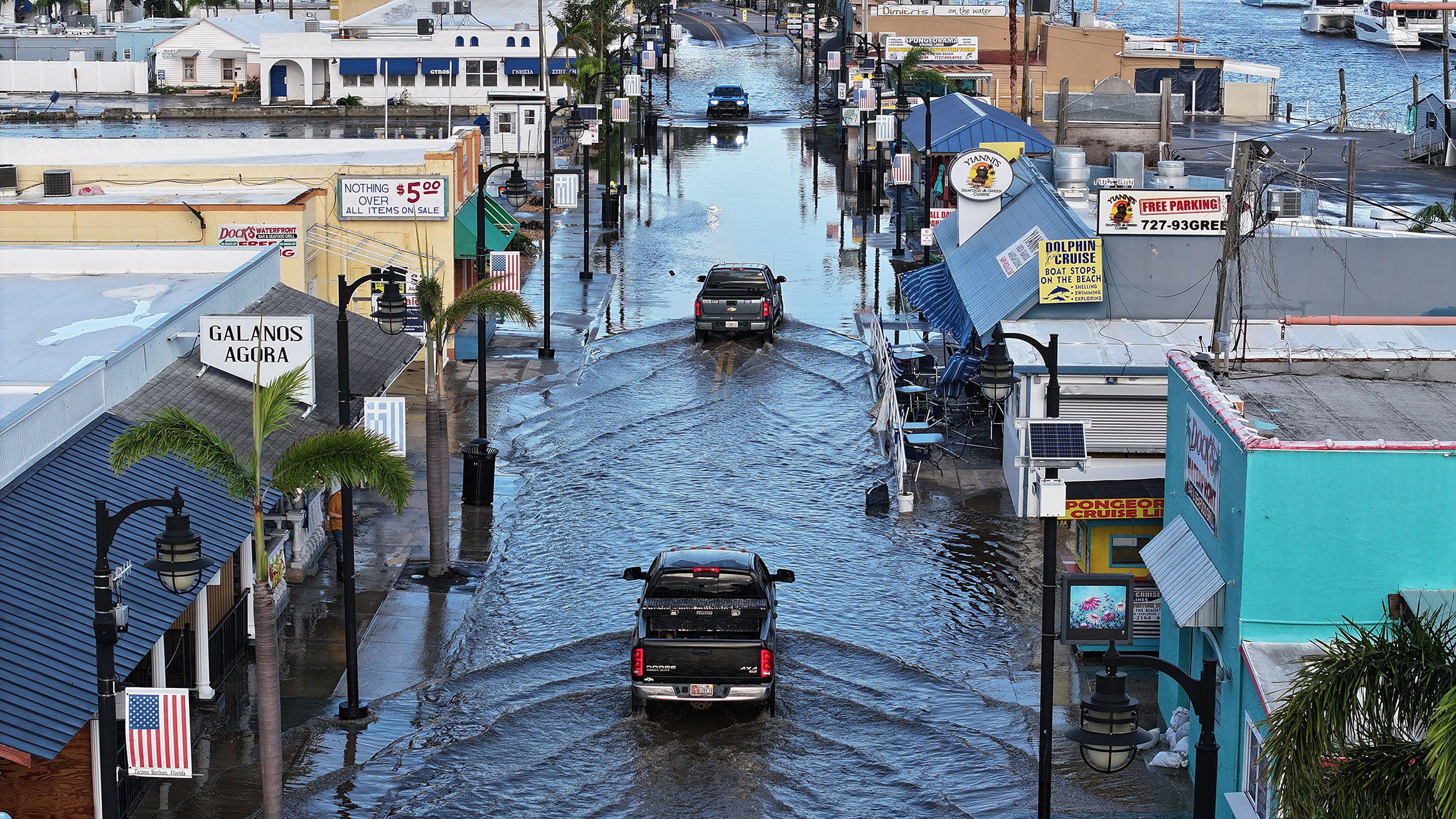 Flood waters inundate the main street after Hurricane Helene passed offshore on September 27, 2024, in Tarpon Springs, Florida.