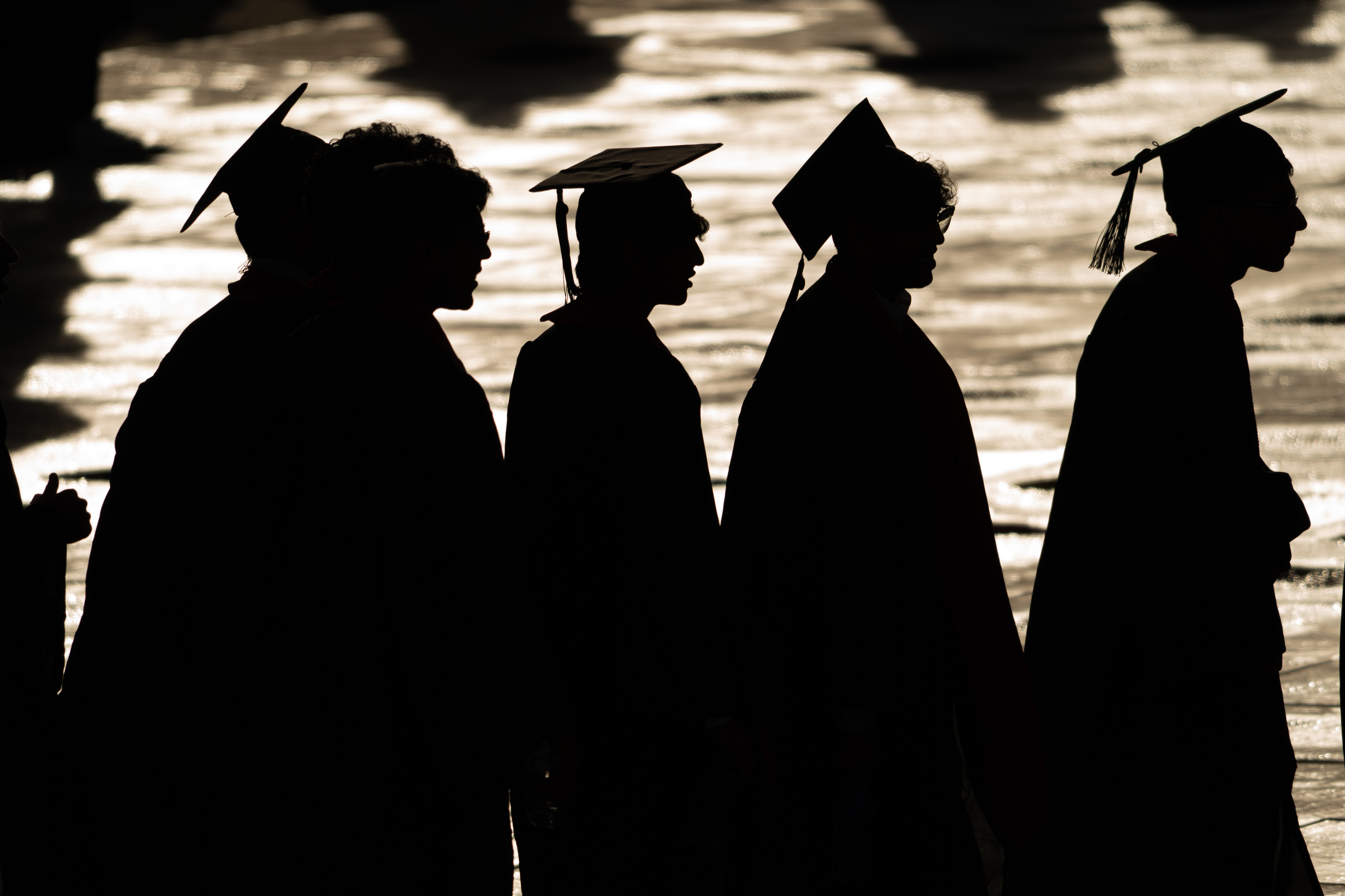 Kids graduating highschool or college. 