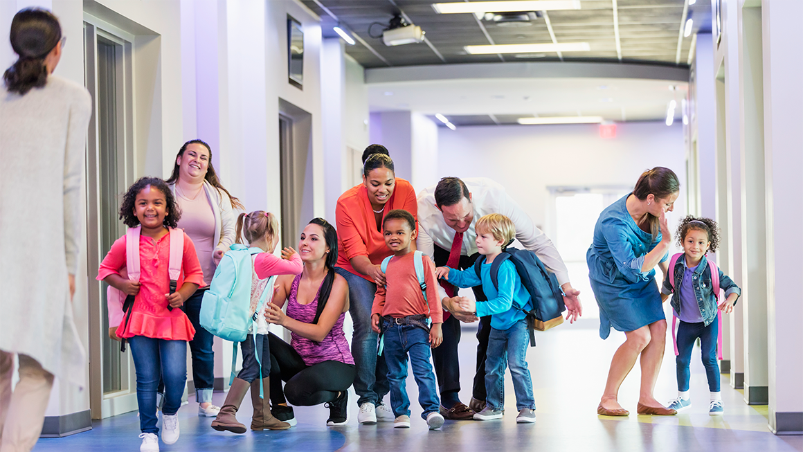 photo of teachers and young students