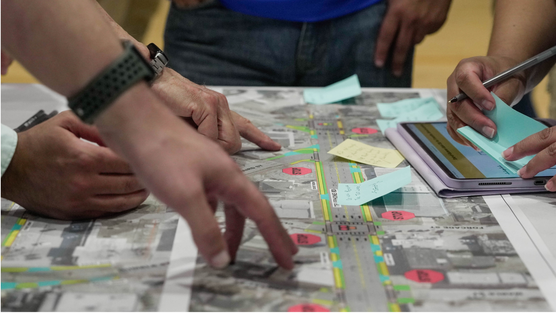 HOUSTON, TEXAS - AUGUST 19: People leave suggestions on sticky notes over a proposed map during a public open house hosted by the Harrisburg Redevelopment Authority for residents and business owners to weigh in on the future of a road project, Tuesday, Aug. 19, 2025, in Houston. (Raquel Natalicchio/Houston Chronicle via Getty Images)