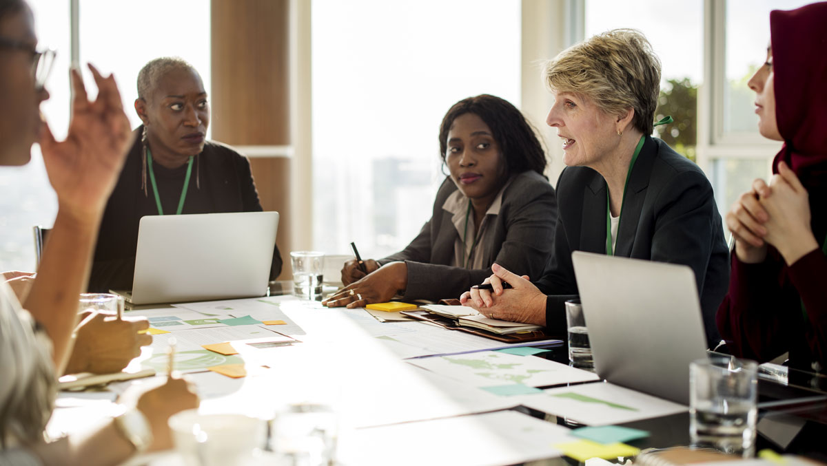 Team Meeting around table
