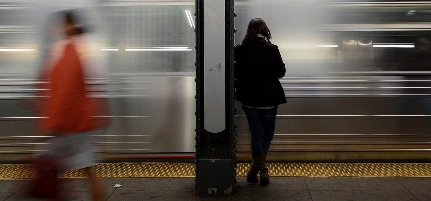 Person waits for the subway