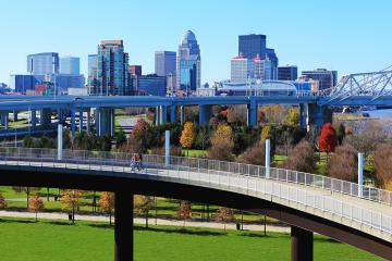 The Louisville, Kentucky skyline with pedestrian walkway in front.