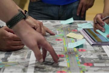 HOUSTON, TEXAS - AUGUST 19: People leave suggestions on sticky notes over a proposed map during a public open house hosted by the Harrisburg Redevelopment Authority for residents and business owners to weigh in on the future of a road project, Tuesday, Aug. 19, 2025, in Houston. (Raquel Natalicchio/Houston Chronicle via Getty Images)