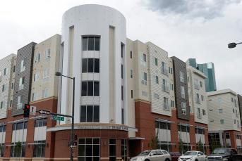 A building on a corner. 