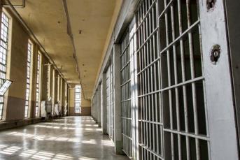 Image of an empty hallway in a prison