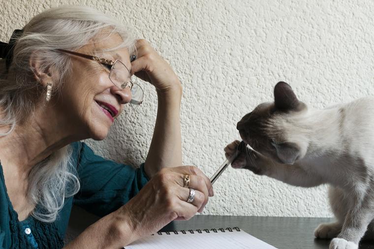 photo of older adult with cat