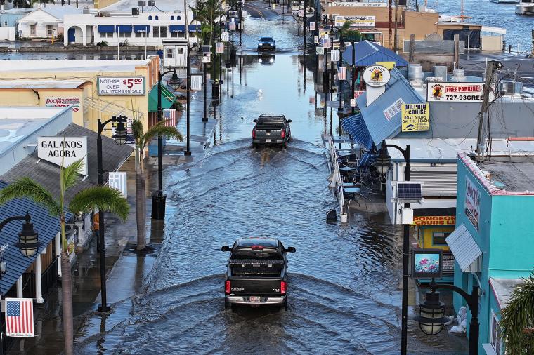 Flood waters inundate the main street after Hurricane Helene passed offshore on September 27, 2024 in Tarpon Springs, Florida. 
