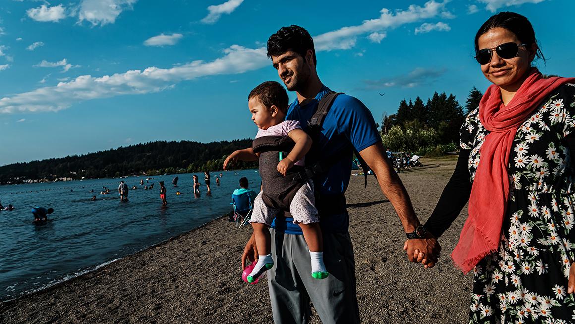 Afghan refugees visit a park nearby their home in Seattle, Washington