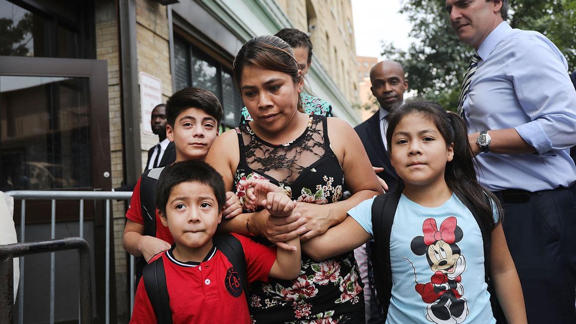 photo of  Immigrant Mother Reunited With Her Three Children After Being Detained Separately