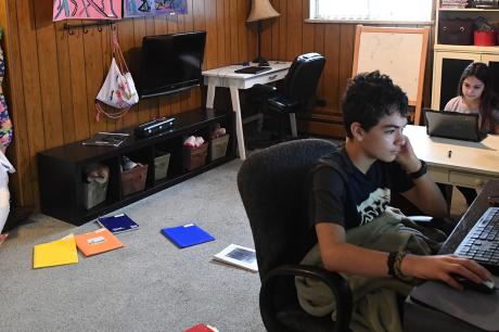 Kids working on remote learning during pandemic