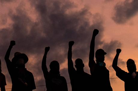 Protestors chant "Say His Name, George Floyd" near a memorial for George Floyd at the intersection of 38th Street and Chicago Avenue on Tuesday, June 2, 2020, in Minneapolis, MN