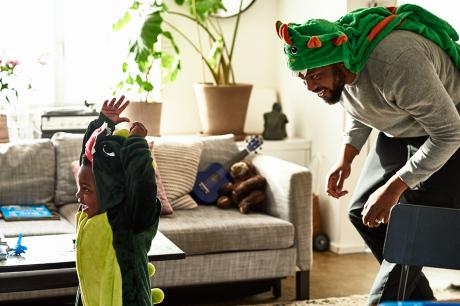 Dad and child play dress up