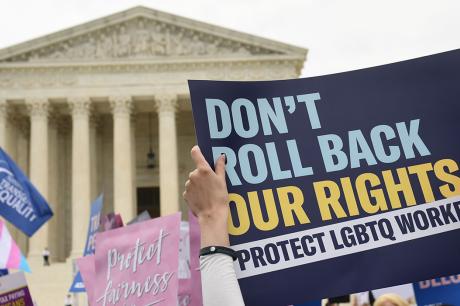 Demonstrators in favor of LGBT rights rally outside Supreme Court
