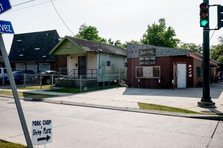 A sign announces food at a market in New Orleans
