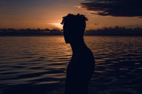 Man looks at water