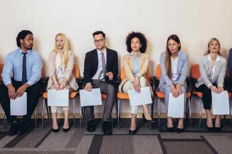 Job applicants wait to be interviewed