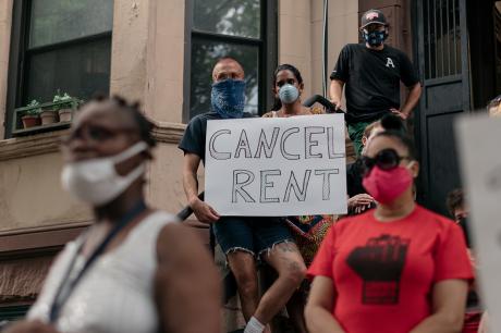 Housing activists gather to protest alleged tenant harassment by a landlord and call for cancellation of rent in the Crown Heights neighborhood on July 31, 2020 in Brooklyn, New York. 