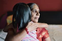 Mother and child embracing. 