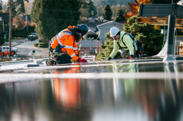 Workers installing solar pannels