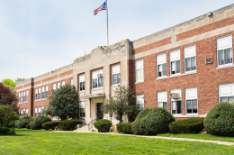 The façade of a middle or high school.