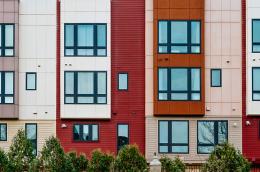 Photo of colorful multi-family housing. 