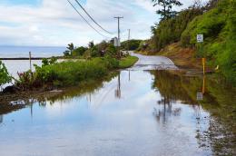 Image of a flooded coastal road in Hawaii.