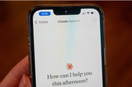 Close-up of a person's hand holding a smartphone and using the Opus 4 model within the Claude app from AI company Anthropic, Lafayette, California, May 22, 2025. (Photo by Smith Collection/Gado/Getty Images)