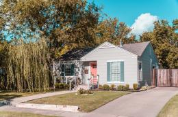 Single-family home with front yard and driveway.