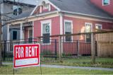  A 'For Rent' sign is posted near a home on February 07, 2022 in Houston, Texas